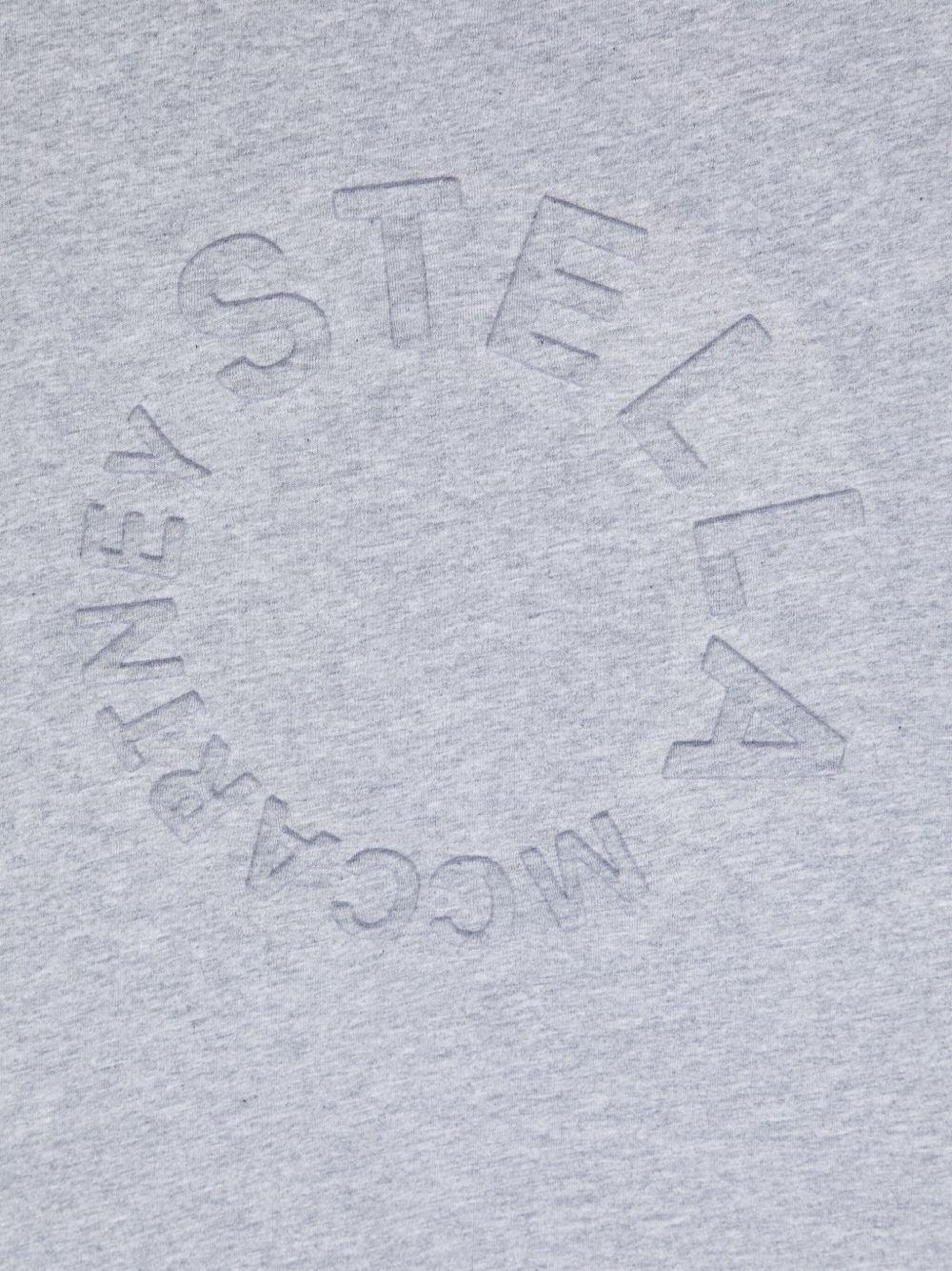 T-shirt per bambina Stella McCartney Kids grigia con logo goffrato sul davanti - Rubino Kids