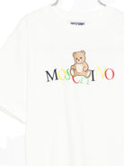 T-shirt per bambini Moschino Kids bianco con logo Teddy Bear - Rubino Kids