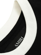 T-shirt per bambino Amiri Kids nera con stampa logo - Rubino Kids