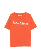 T-shirt per bambino Bobo Choses arancione con scritta logo sul davanti - Rubino Kids