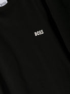 T-shirt per bambino BOSS Kidswear nero con logo goffrato bianco - Rubino Kids