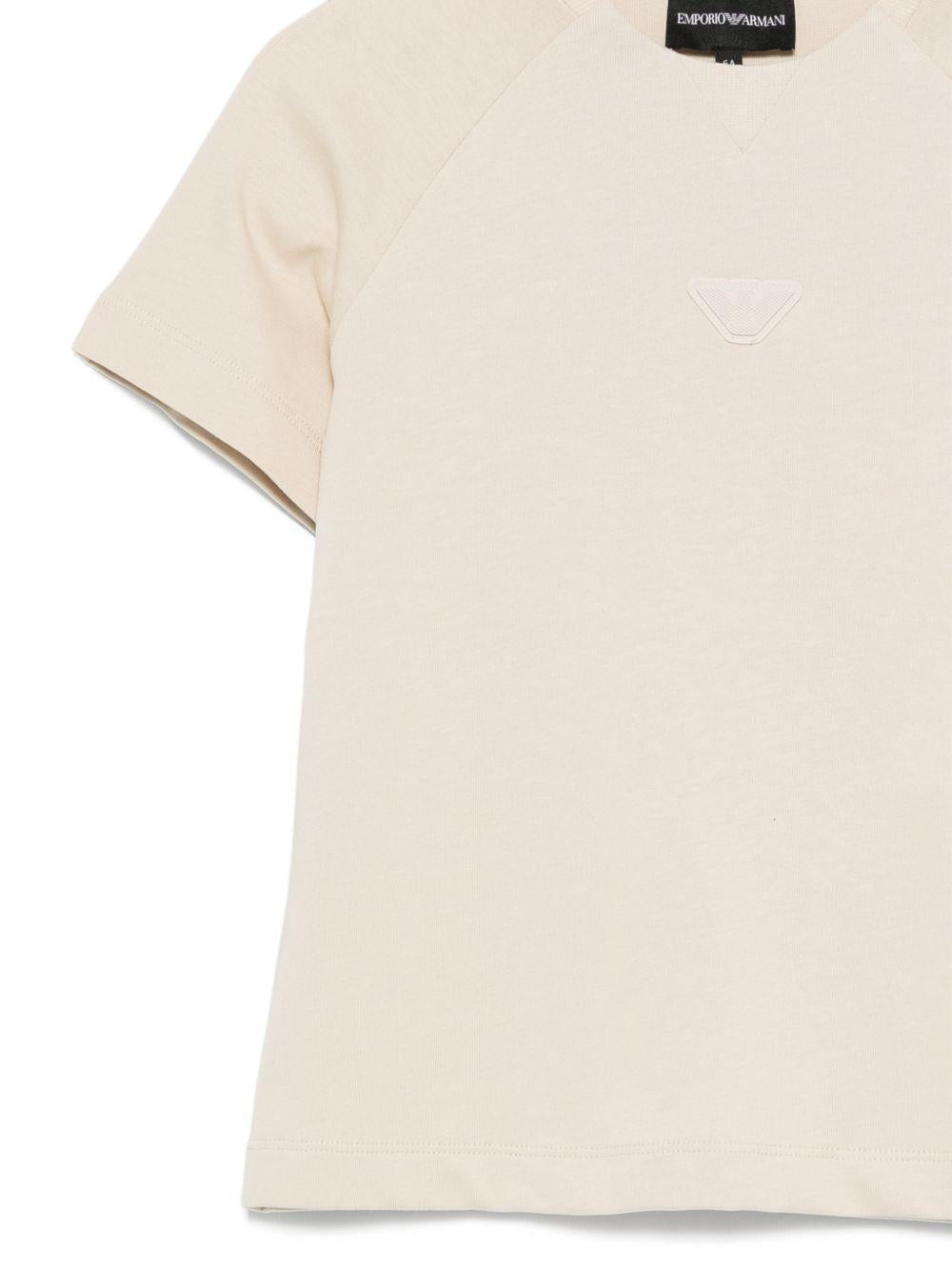 T-shirt per bambino Emporio Armani Kids beige con maniche raglan - Rubino Kids