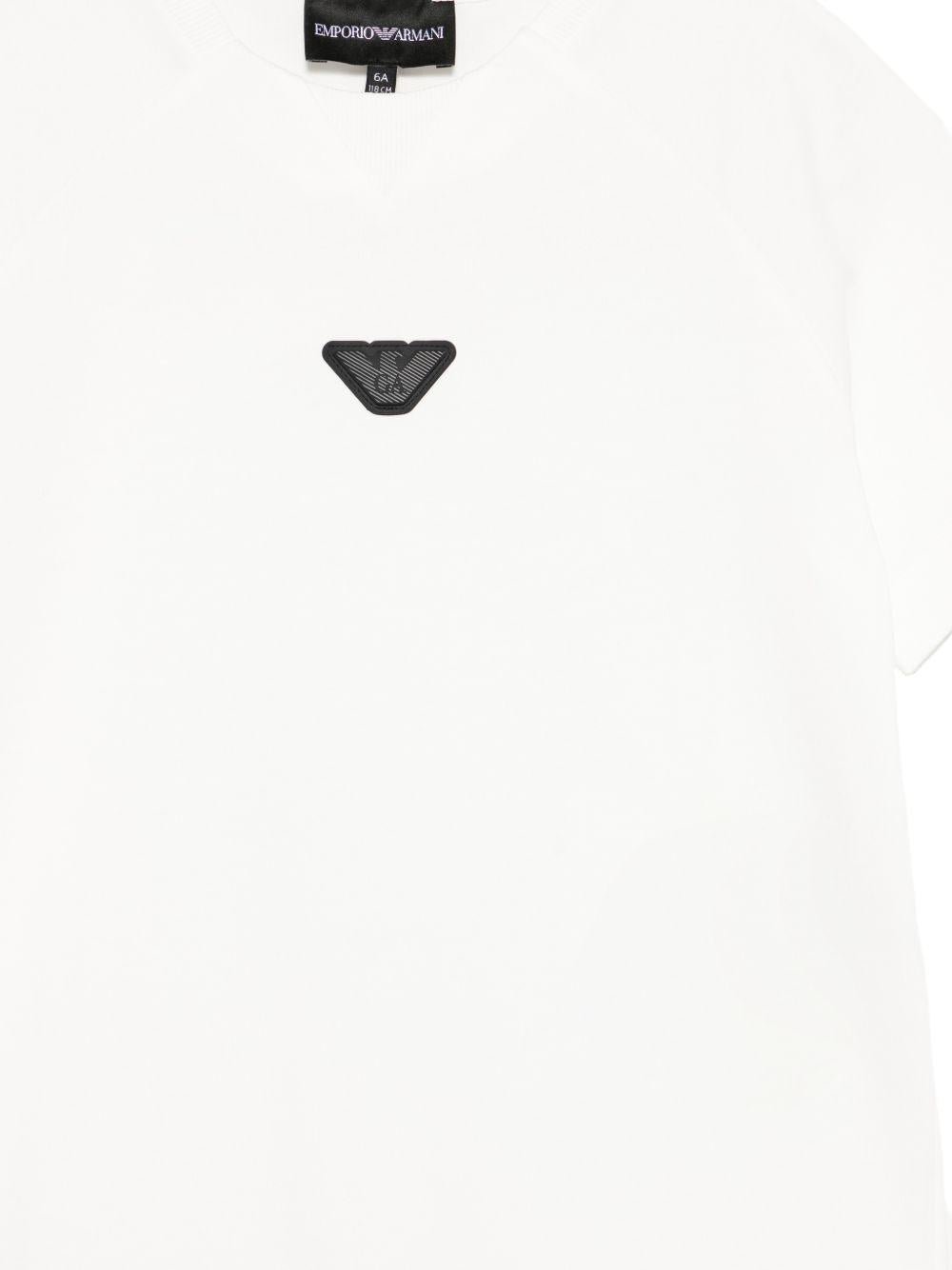 T-shirt per bambino Emporio Armani Kids bianca con logo Aquila sul davanti - Rubino Kids