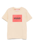 T-shirt per bambino Hugo Kids beige con logo sul davanti - Rubino Kids