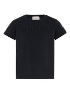T-shirt per bambino Moncler Enfant nera con logo goffrato - Rubino Kids