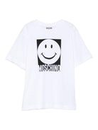 T-shirt per bambino Moschino Kids bianco con motivo smiley - Rubino Kids