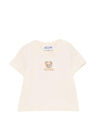 T-shirt per neonati Moschino Kids beige con dettagli ricamati - Rubino Kids