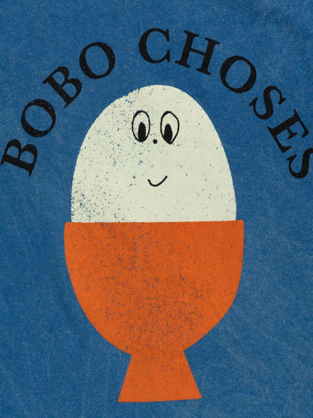 T-shirt per neonato Bobo Choses Morning Egg blu con stampa sul petto - Rubino Kids