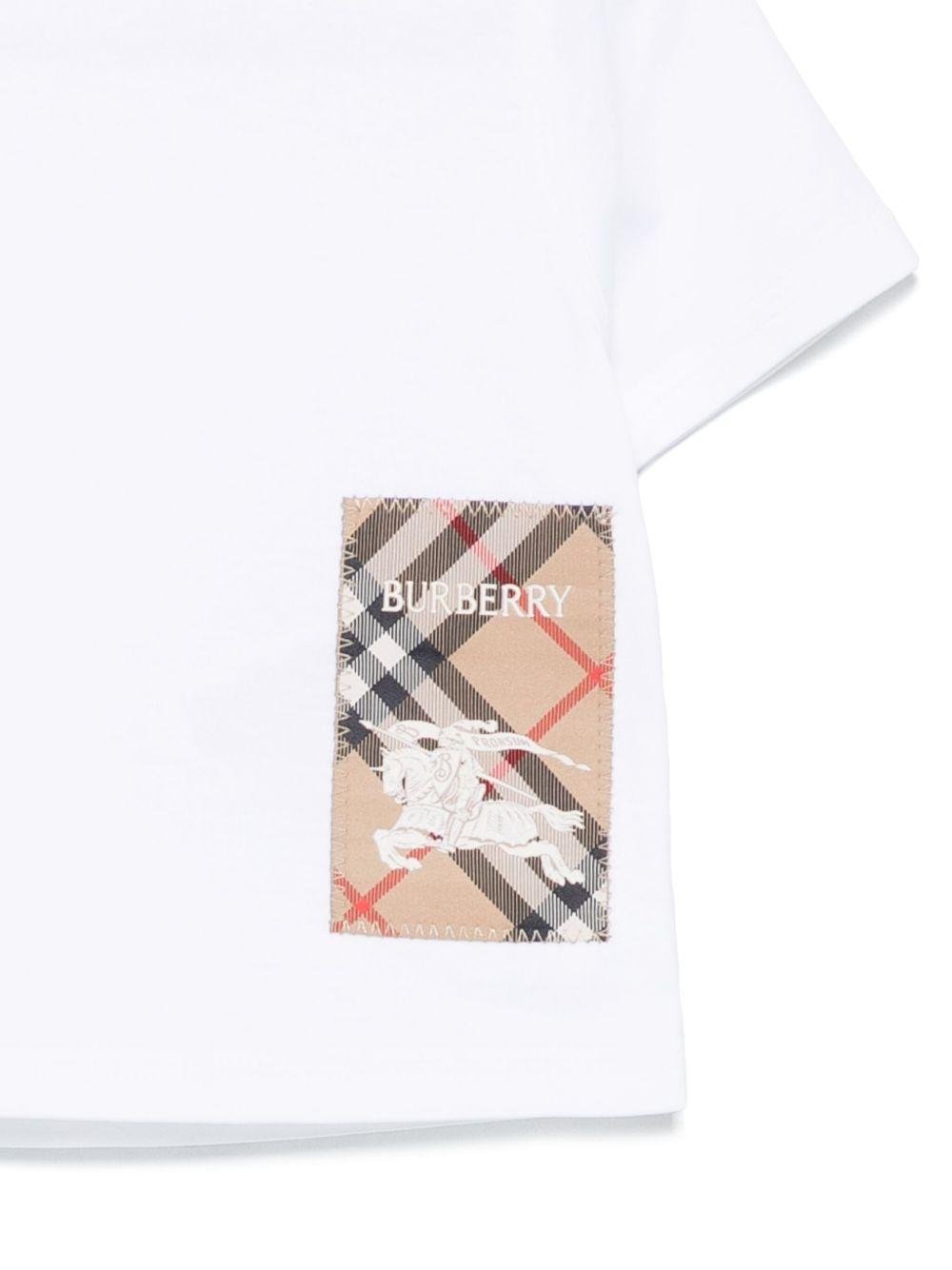 T-shirt per neonato Burberry Kids bianco in cotone con toppa con logo sul davanti - Rubino Kids