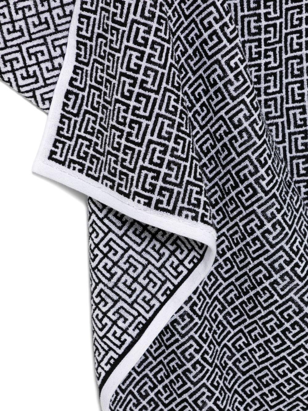 Telo mare per bambini Balmain Kids bianco e nero con stampa geometrica all - over - Rubino Kids