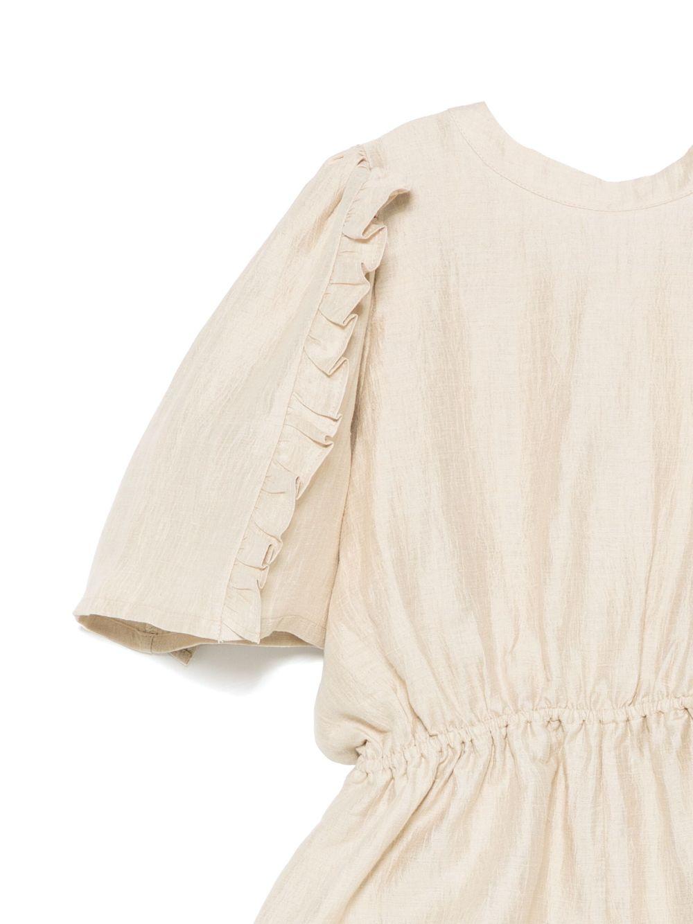 Tuta corta per bambina Donsje Femmie beige con dettagli con ruches - Rubino Kids