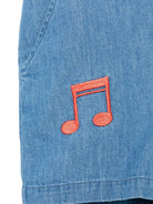 Tuta corta per bambina in denim con ricamo e due tasche diagonali laterali - Rubino Kids
