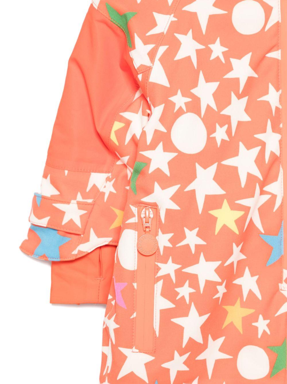 Tuta da neve per neonati Stella McCartney Kids arancione con motivo stelle - Rubino Kids