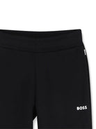 Tuta sportiva per bambino BOSS Kidswear nero con dettaglio logo - Rubino Kids