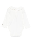 Tutina per neonati Donsje bianca con colletto alla Peter Pan - Rubino Kids