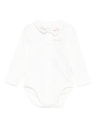 Tutina per neonati Petit Bateau bianca con ricamo a fiori - Rubino Kids